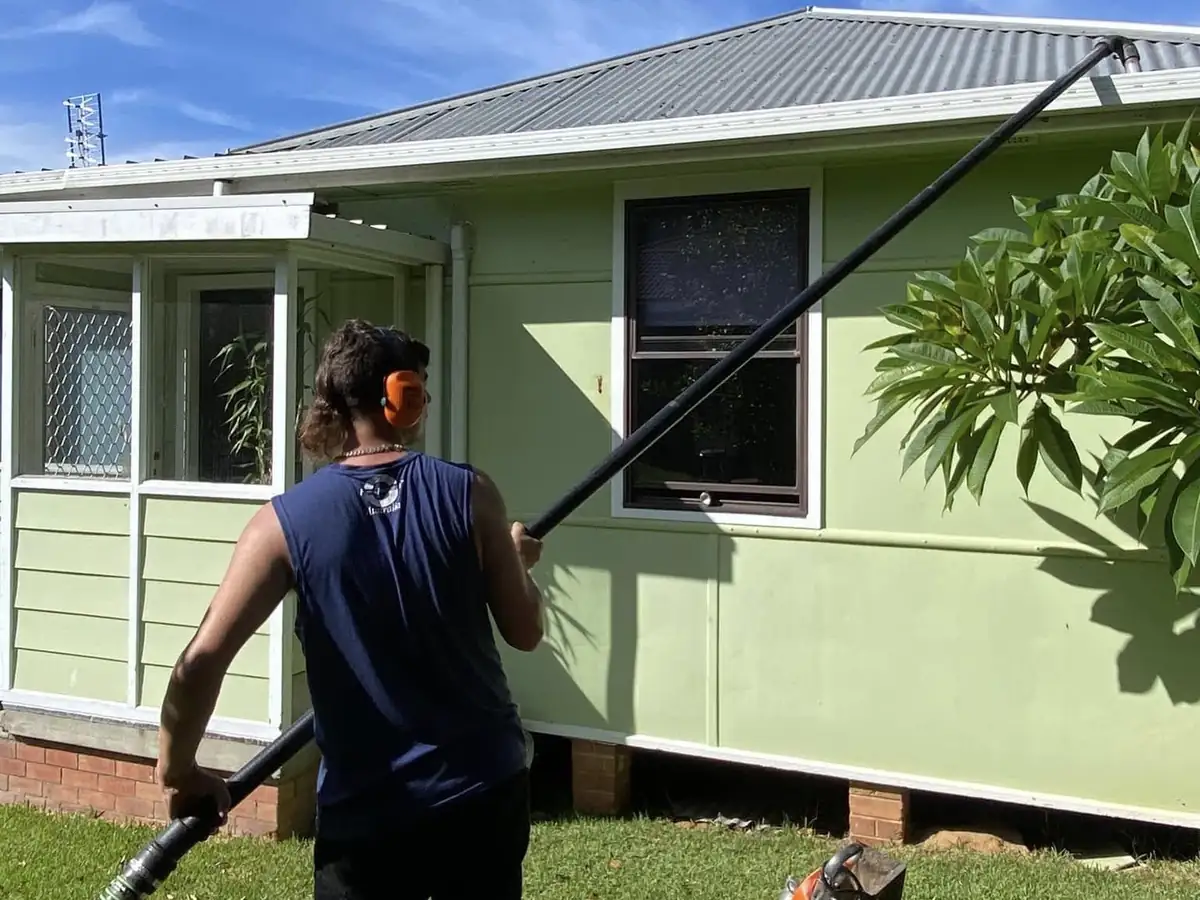 Gutter vacuuming with a pole system at a Nowra home